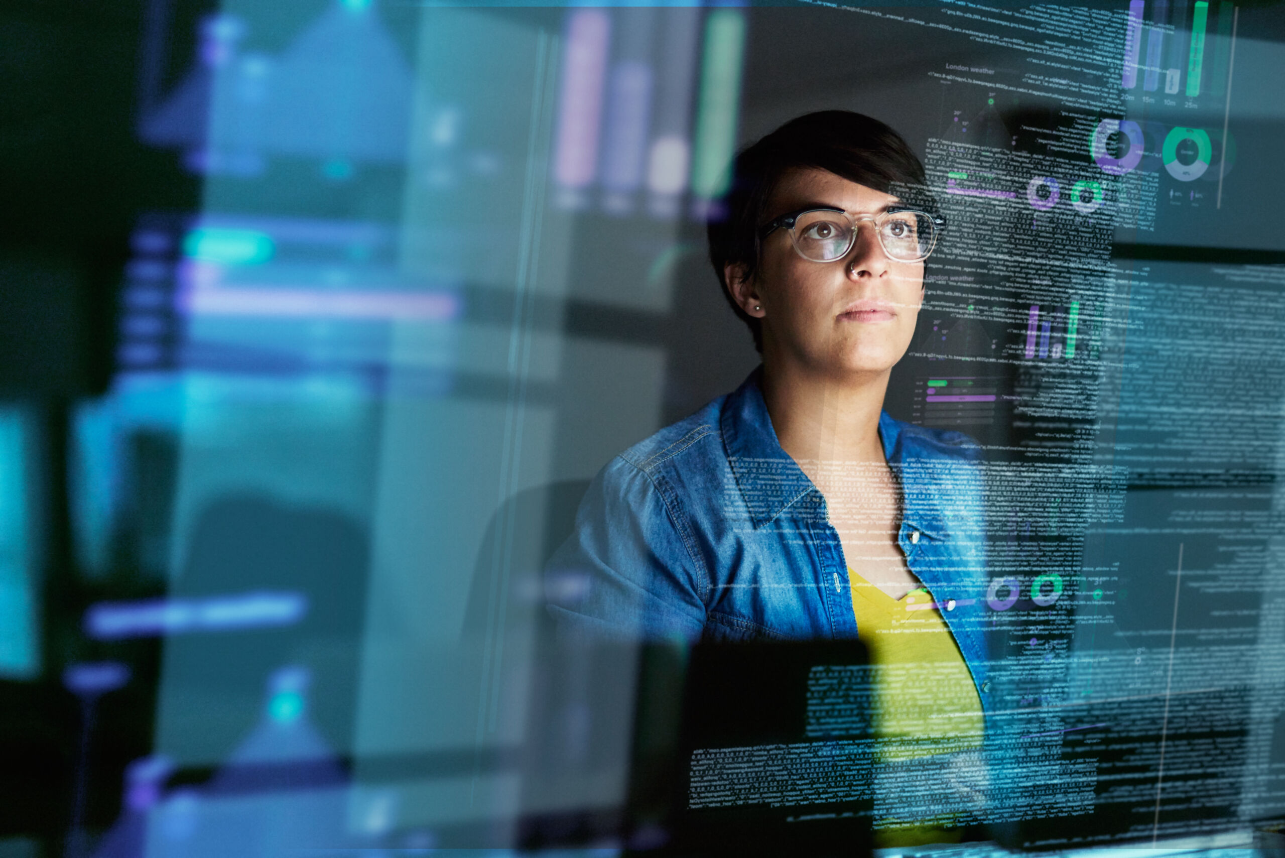 Making progress on her code. Cropped shot of a young computer programmer looking through data.